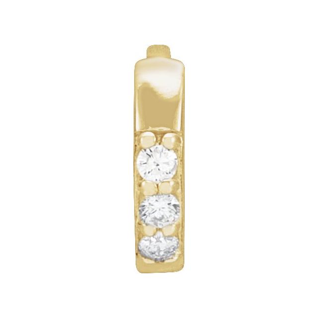 Single diamond accented huggies earrings 8mm 14k gold.