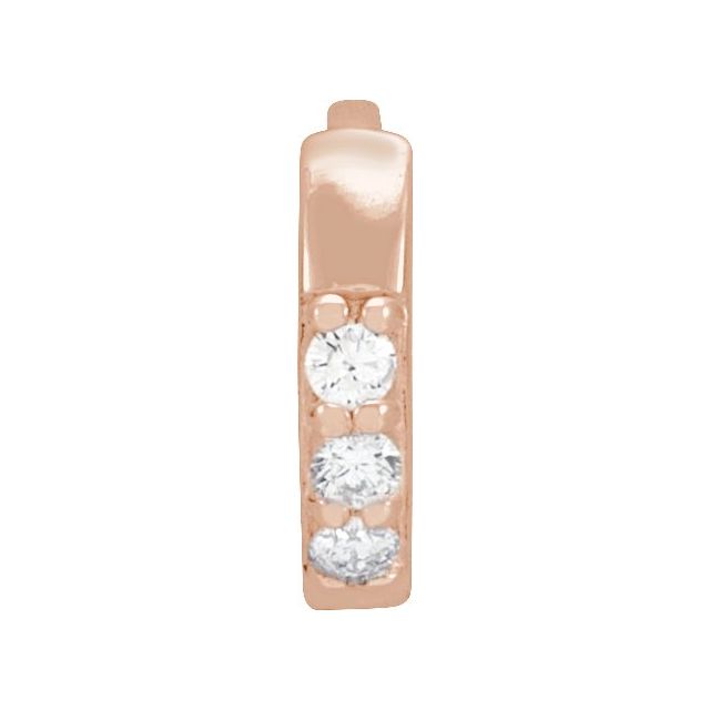 Single diamond accented huggies earrings 8mm 14k rose gold.