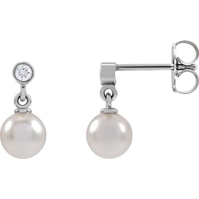 Akoya pearl diamond dangle  earrings in 14k white gold.