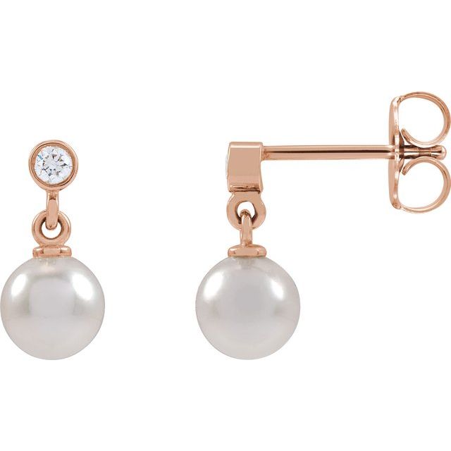 Akoya pearl diamond earrings in 14k rose gold.