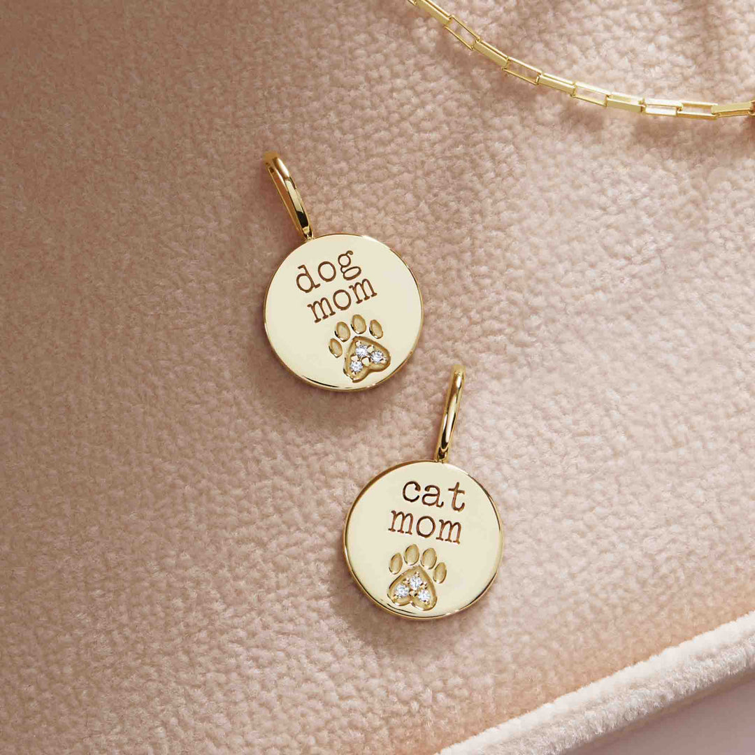 14k solid gold "dog mom" and "cat mom" paw print pendant.