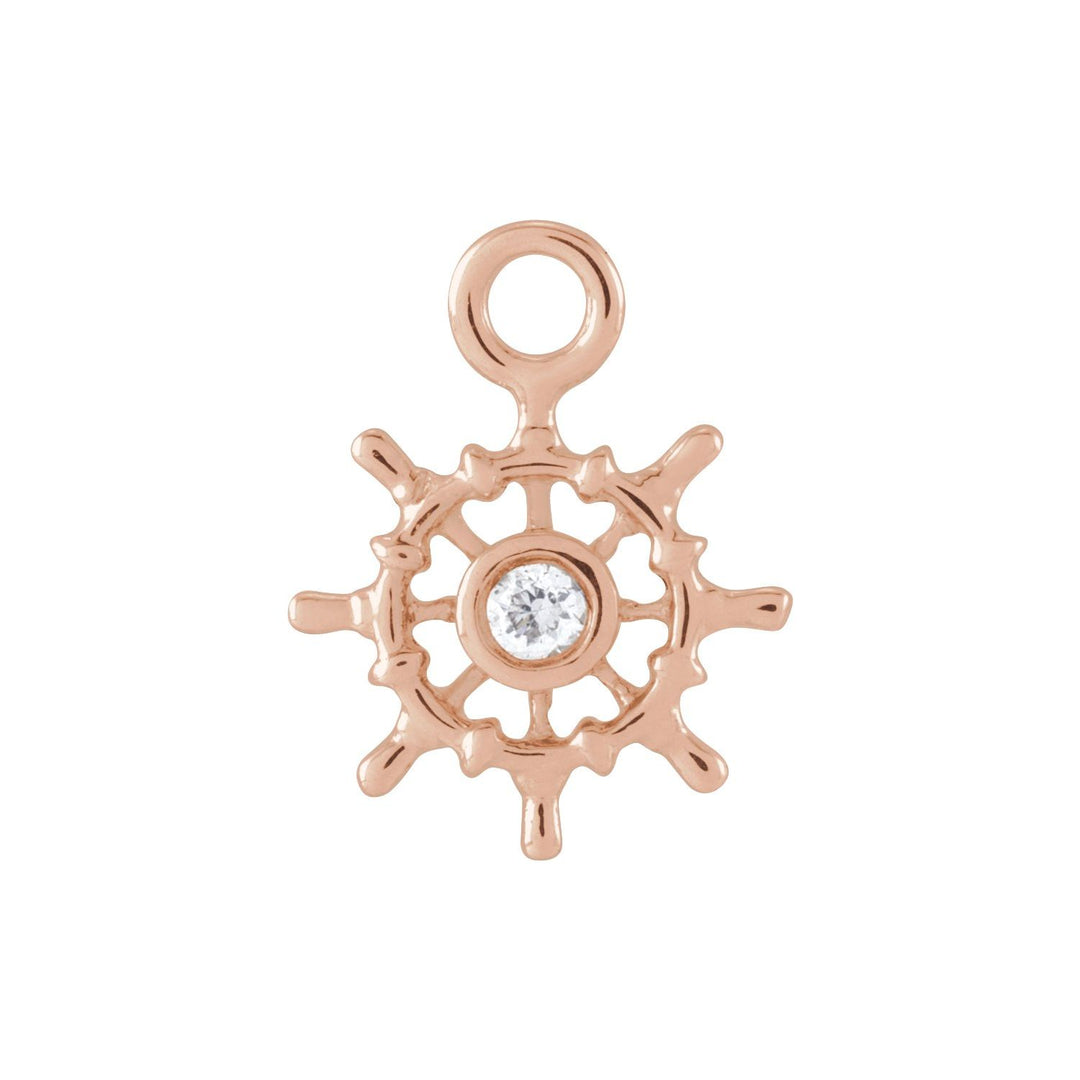 14K rose gold miniature diamond ship wheel dangle.