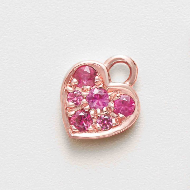 14k rose gold miniature ruby heart dangle charm.