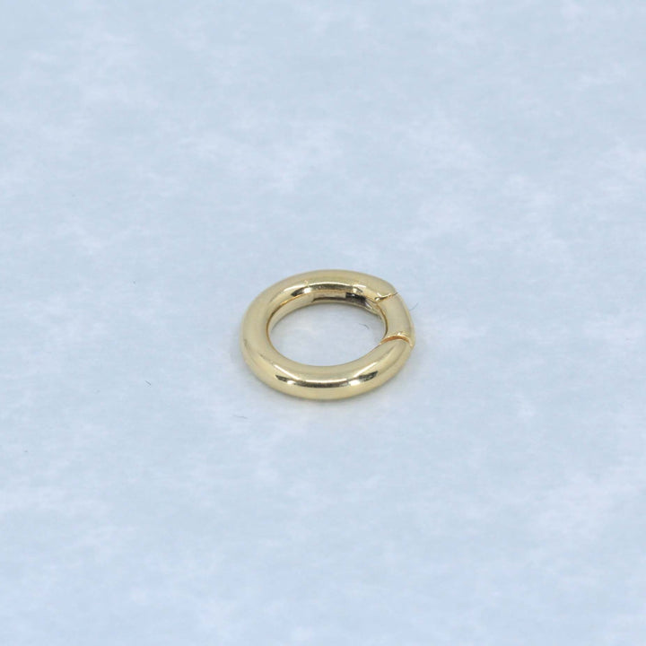14K yellow gold charm clasp.