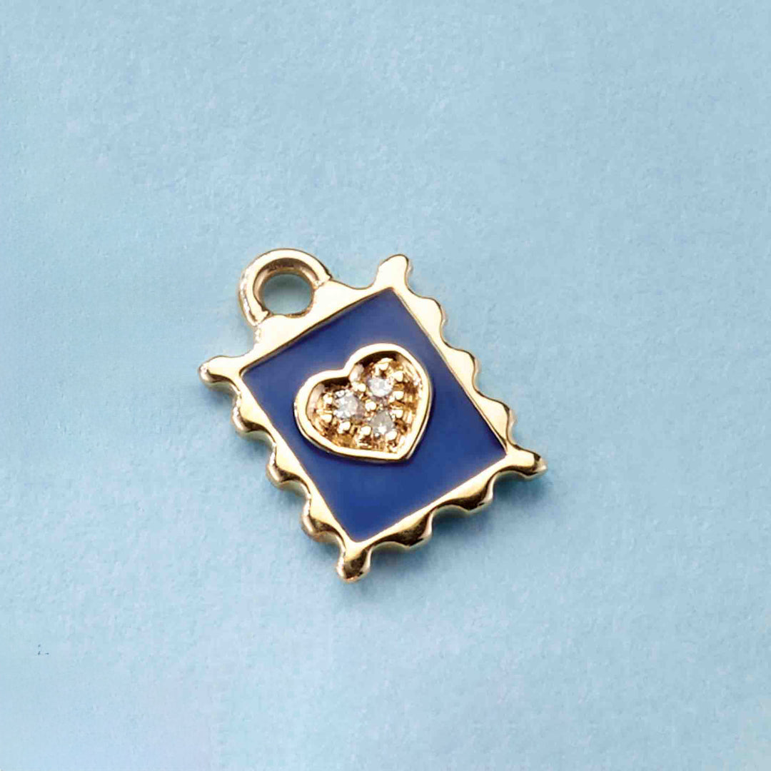 14K gold miniature diamond blue enamel stamp dangle.