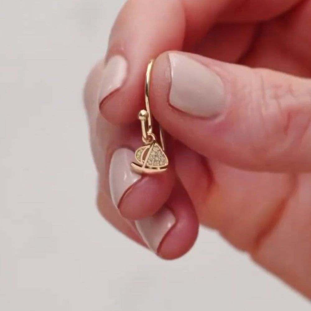 14k gold miniature diamond sailboat dangle on French ear wire..