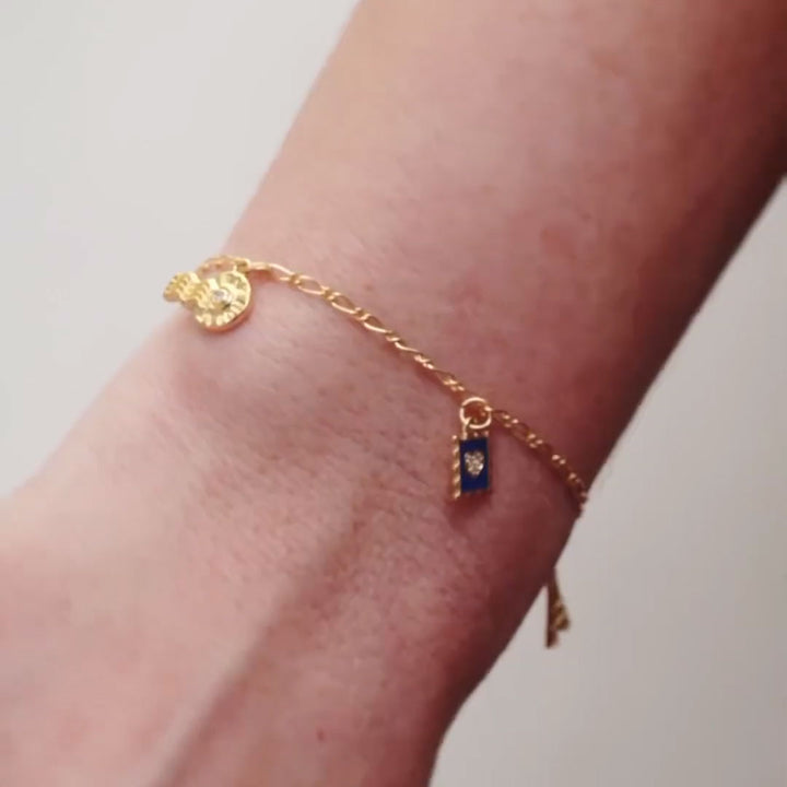 14k gold miniature dangle on bracelet.