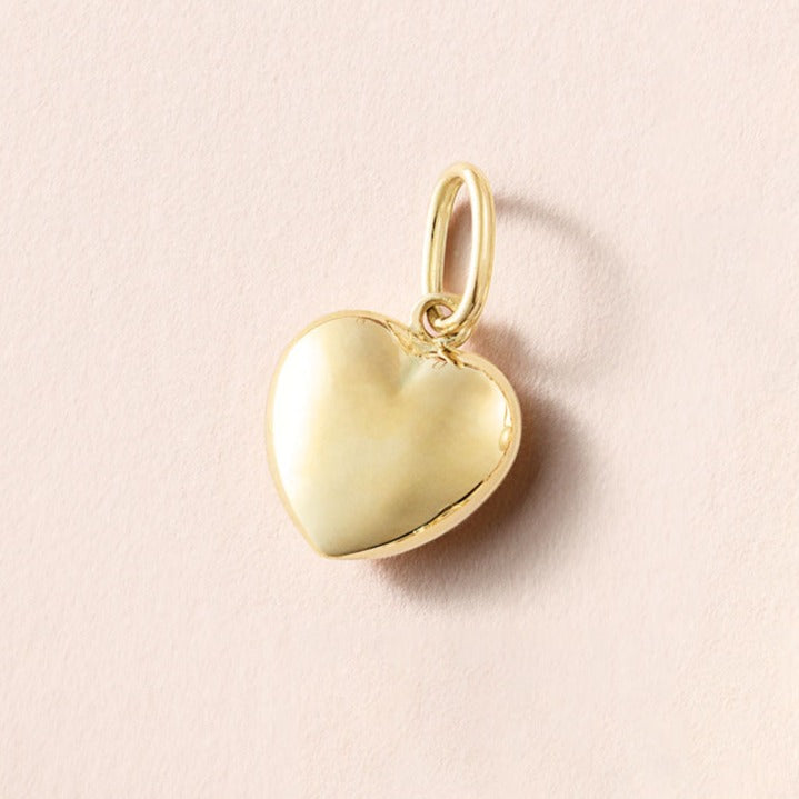 Hollow puffy heart charm pendant.