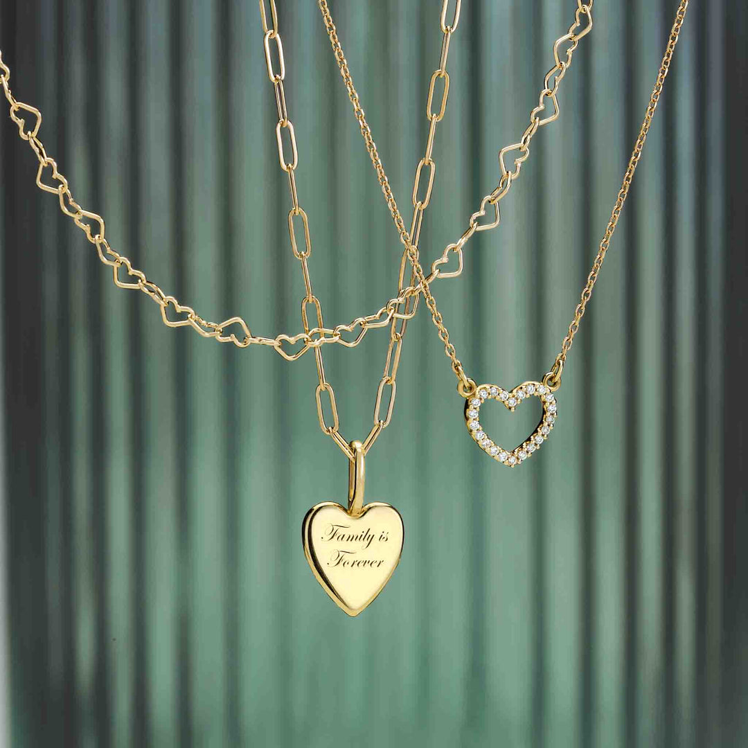 The "Family is Forever" heart pendant on paperclip chain, heart chain necklace and 1/8ctw heart necklace.