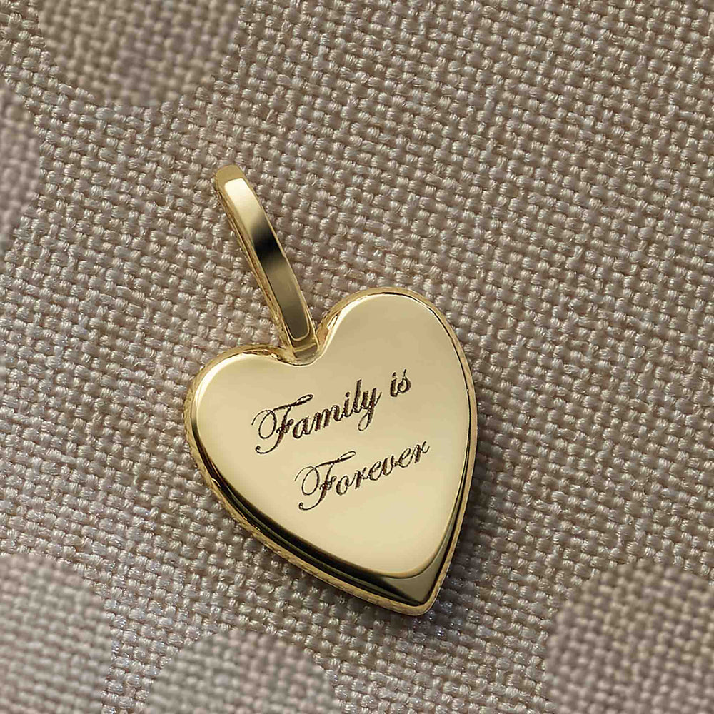 "Family is Forever" heart charm pendant - customizable message engraving.