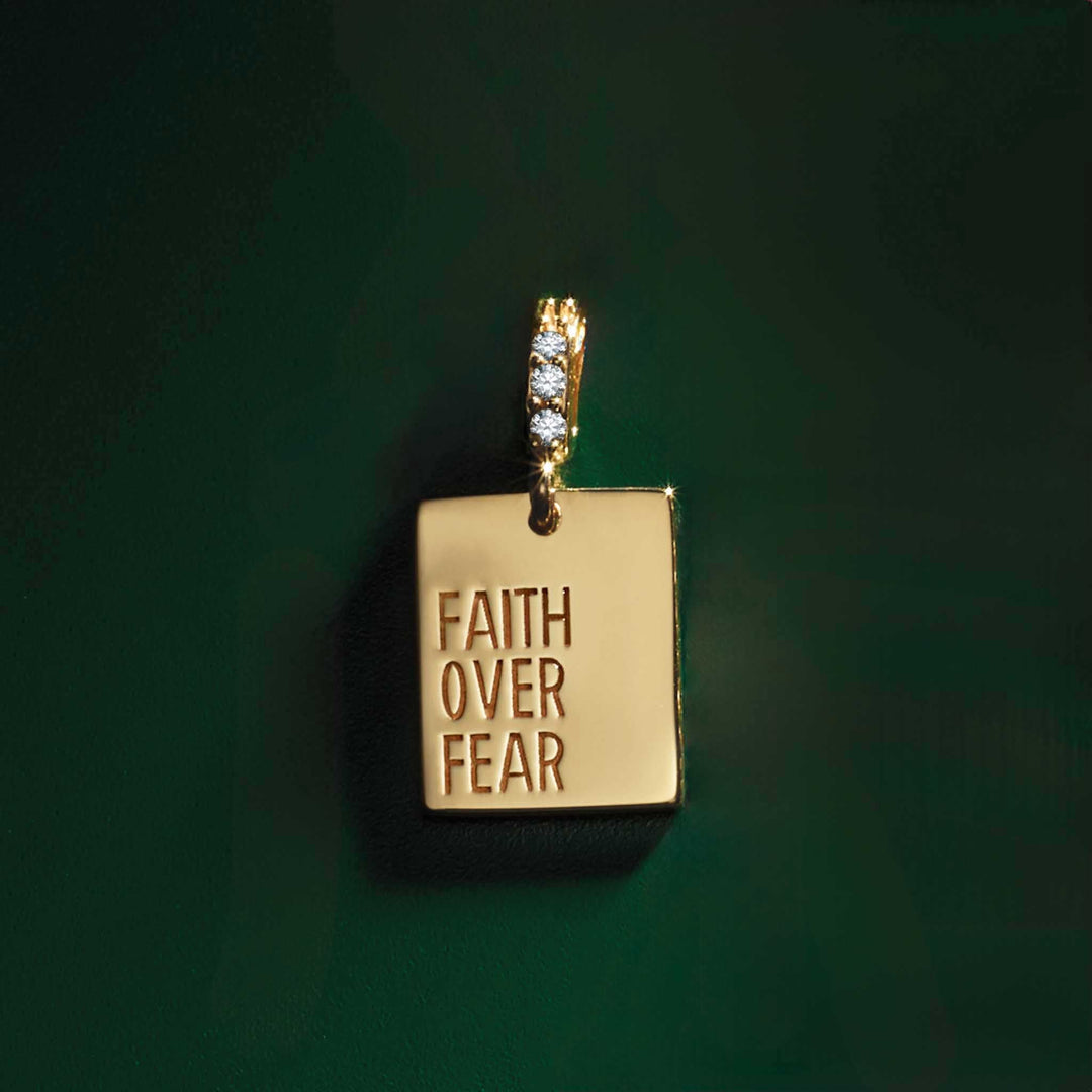 14k gold diamond "Faith Over Fear" pendant.