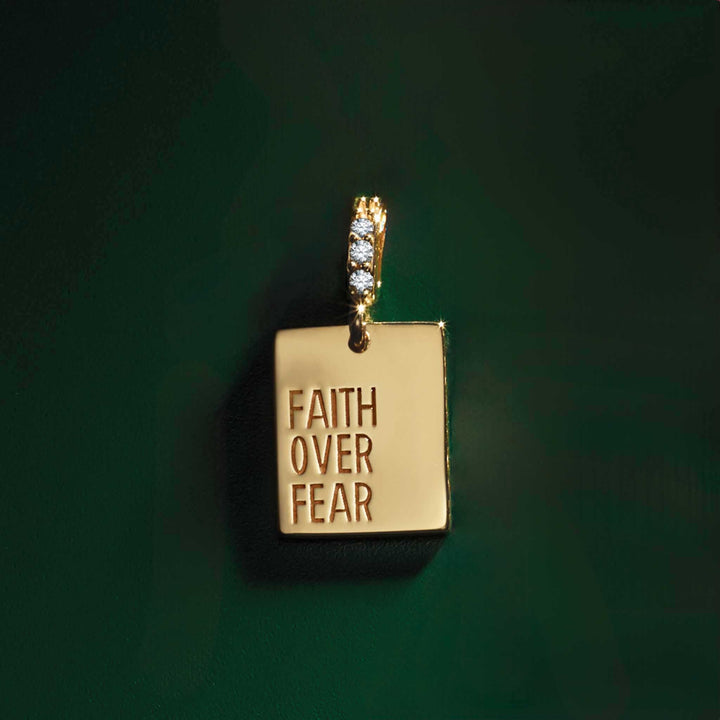 14k gold diamond "Faith Over Fear" pendant.