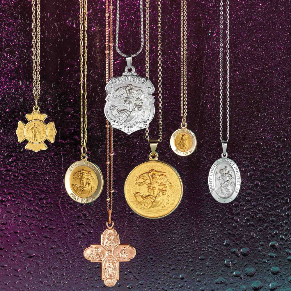 Religious medals and four-way cross.