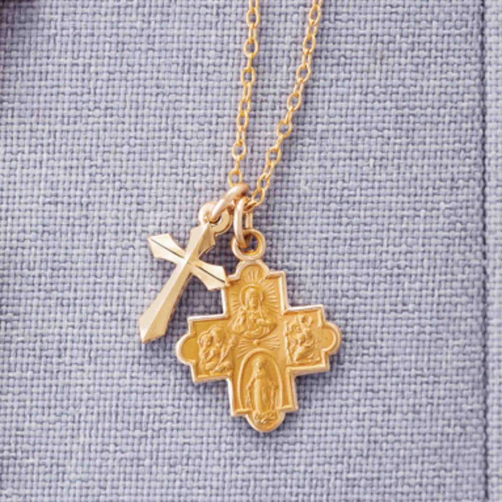 14k gold four-way cross medal Catholicism spiritual and cross pendant.