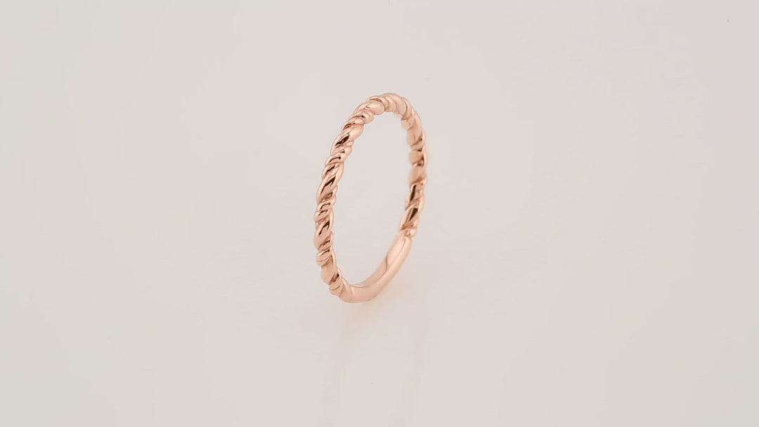 14K rose gold twisted rope ring.