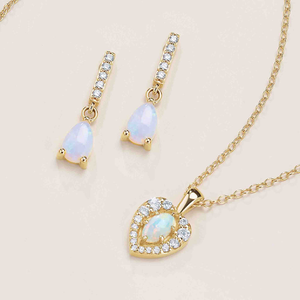 14k gold natural opal necklace and earrings.